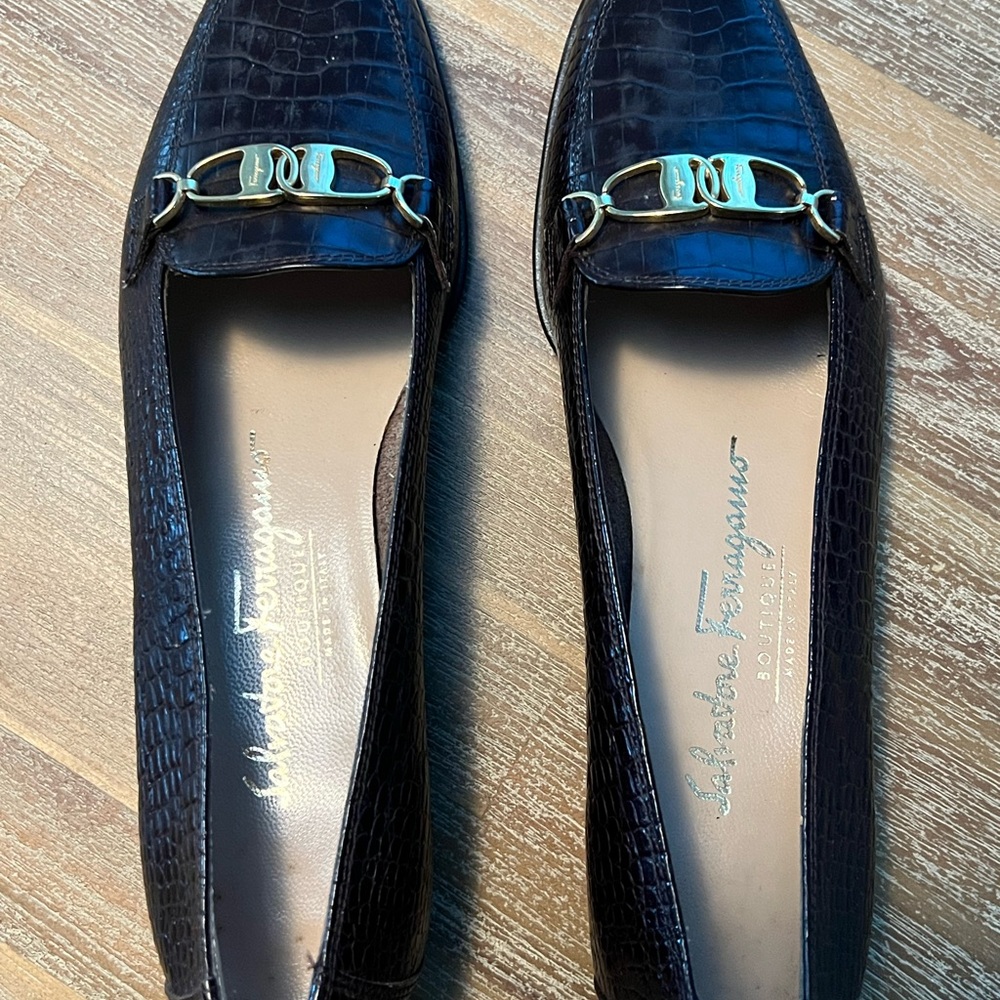 Salvatore Ferragamo Black Flats with Timeless Elegance